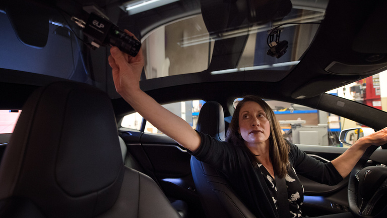 Cher Carney inside NADS' Tesla research vehicle