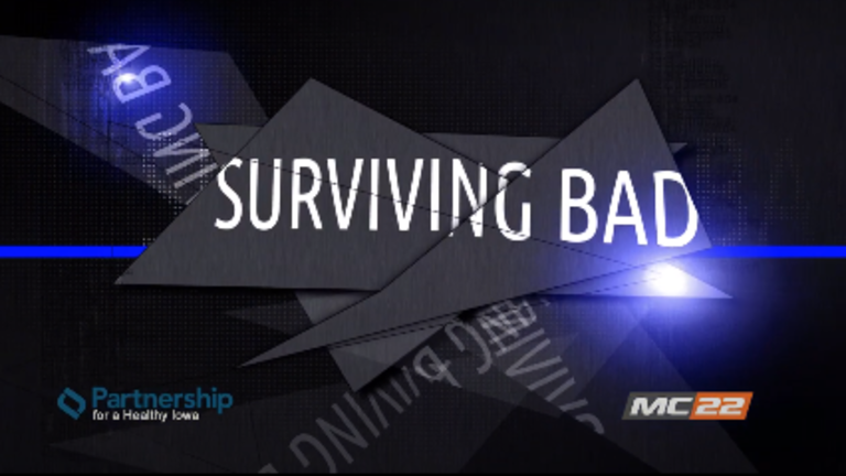 gray and blue screen with white text "surviving bad"